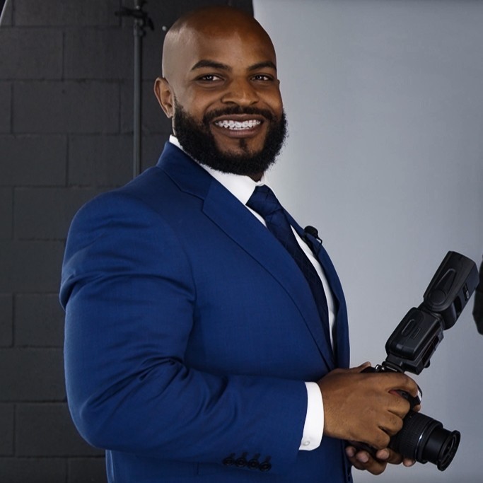 Photographer in navy blue suit